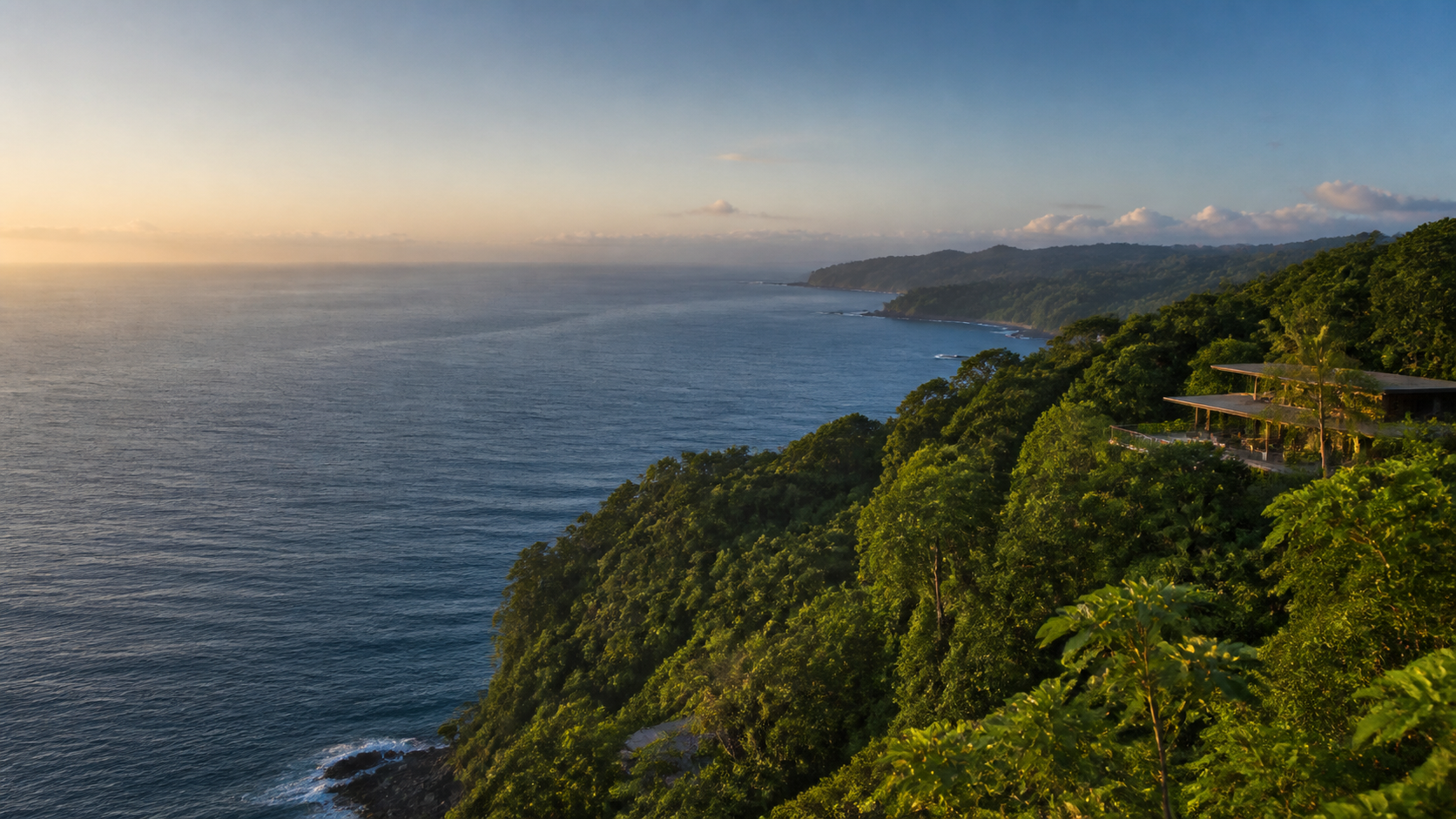 Costa Rica coastline and hillside homes near the ocean.