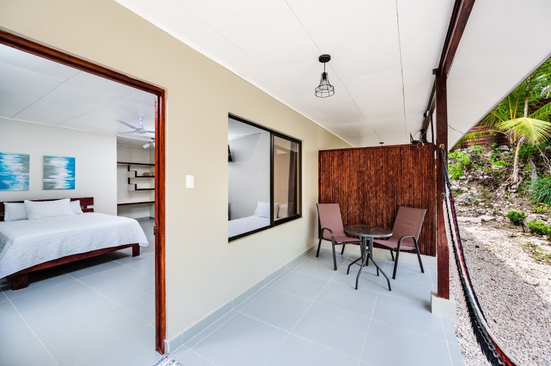 Deluxe guest room at El Sueño Tropical boutique hotel