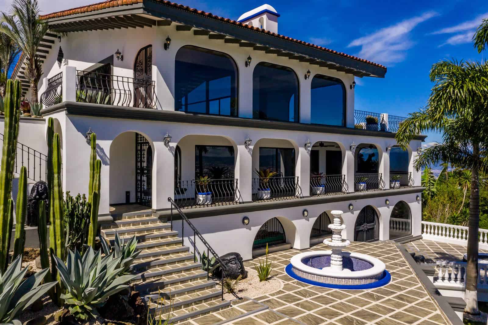 Courtyard with tiled fountain and agave garden