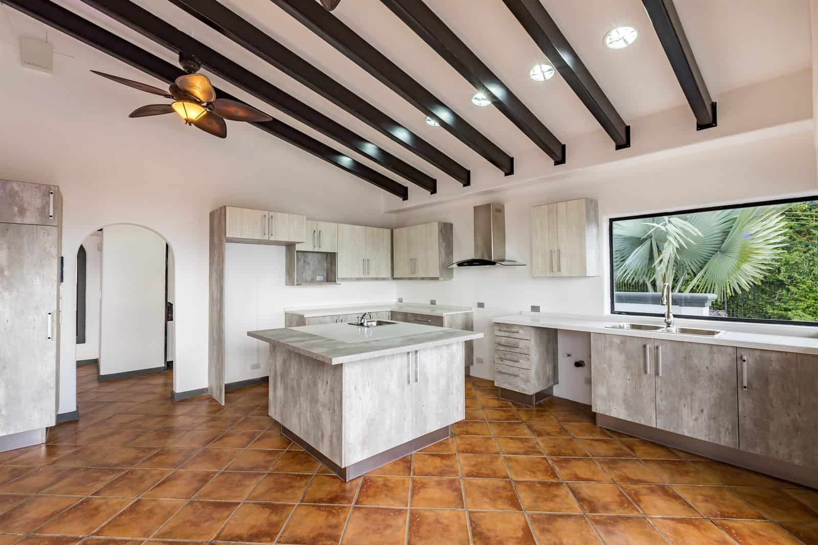 Kitchen with island and valley-view windows