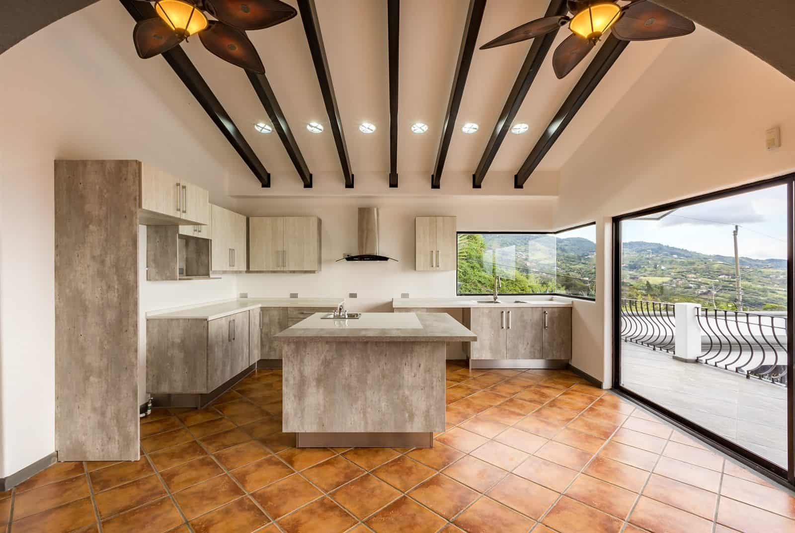 Kitchen with stone counters and wood cabinets