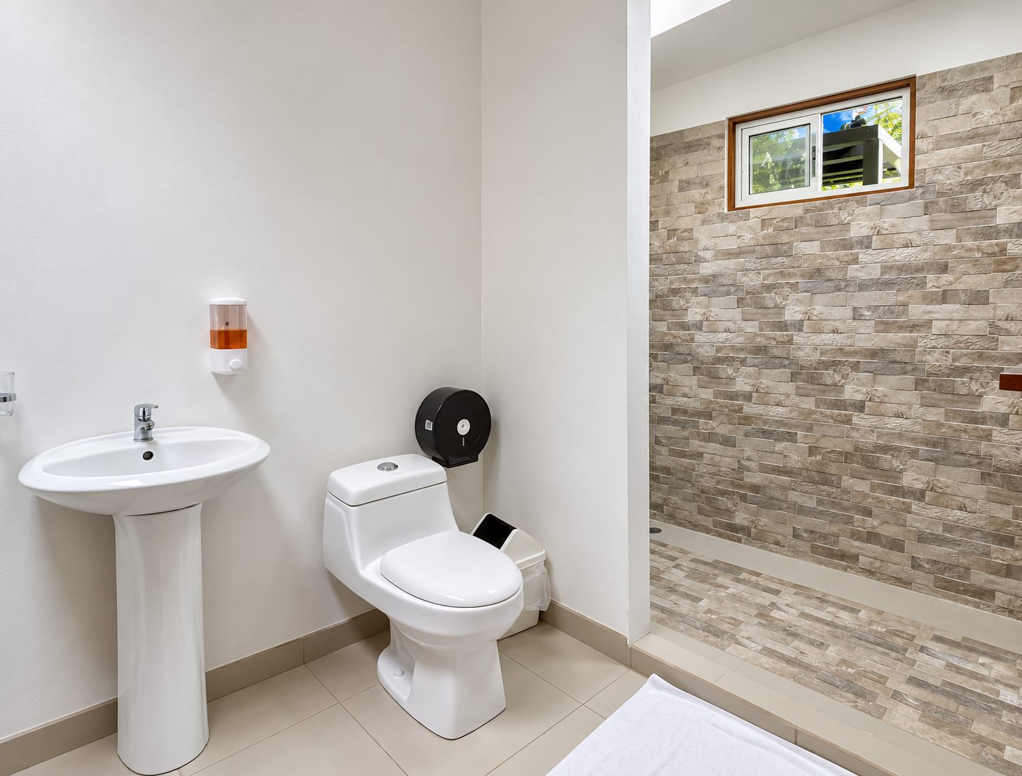 Bathroom with a stone feature wall