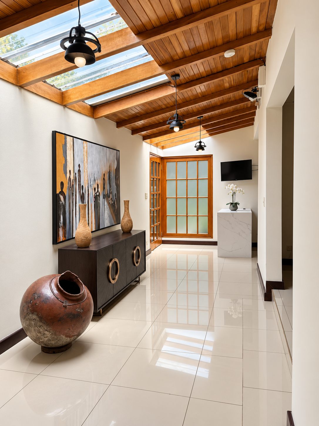 Entrance hall with skylights and wooden ceiling