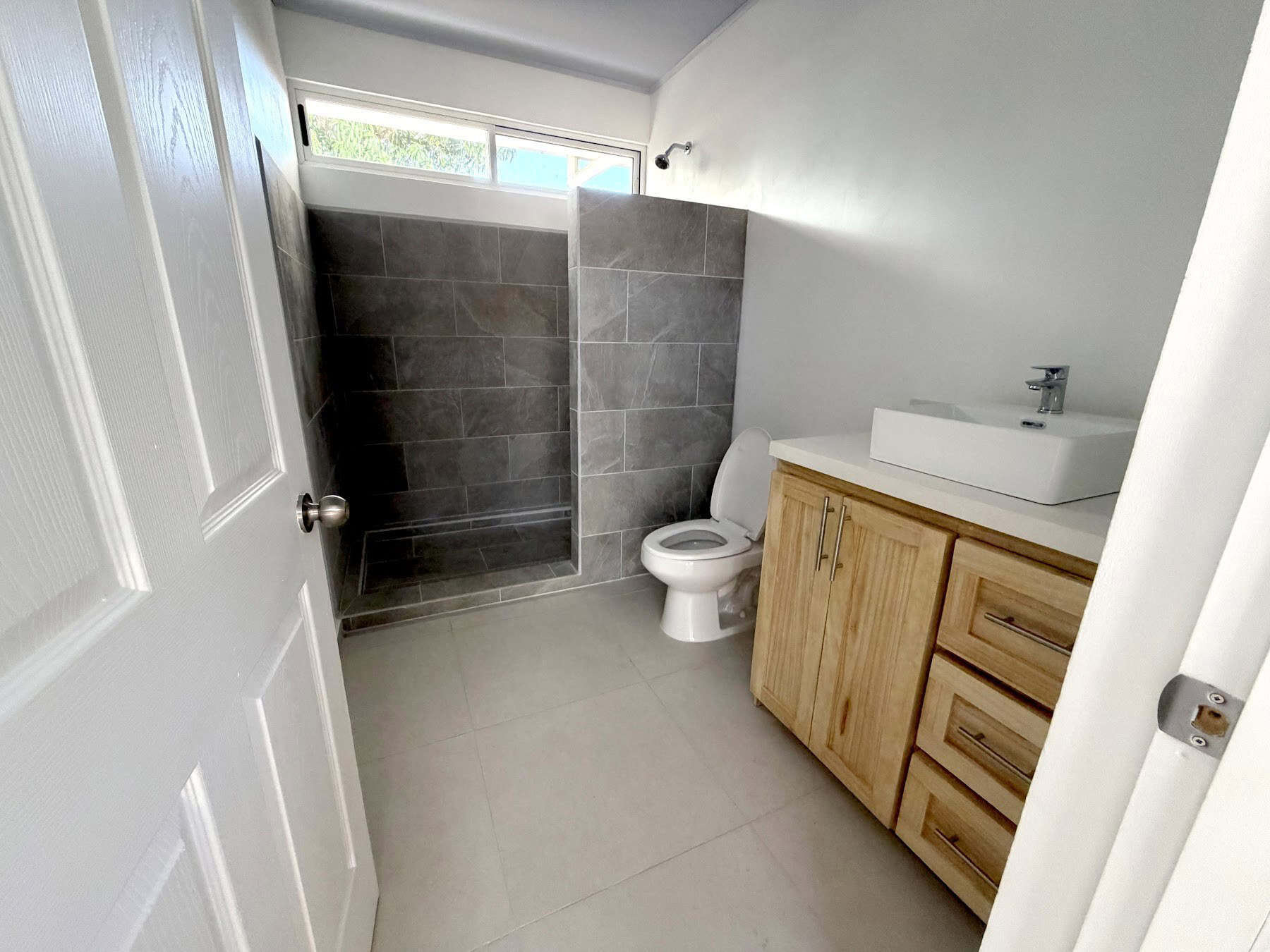 Apartment bathroom with walk-in shower