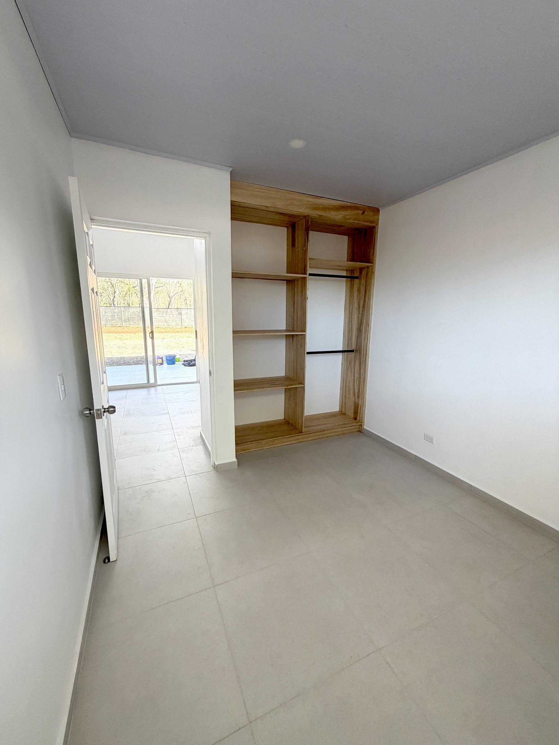 Bedroom with built-in closet