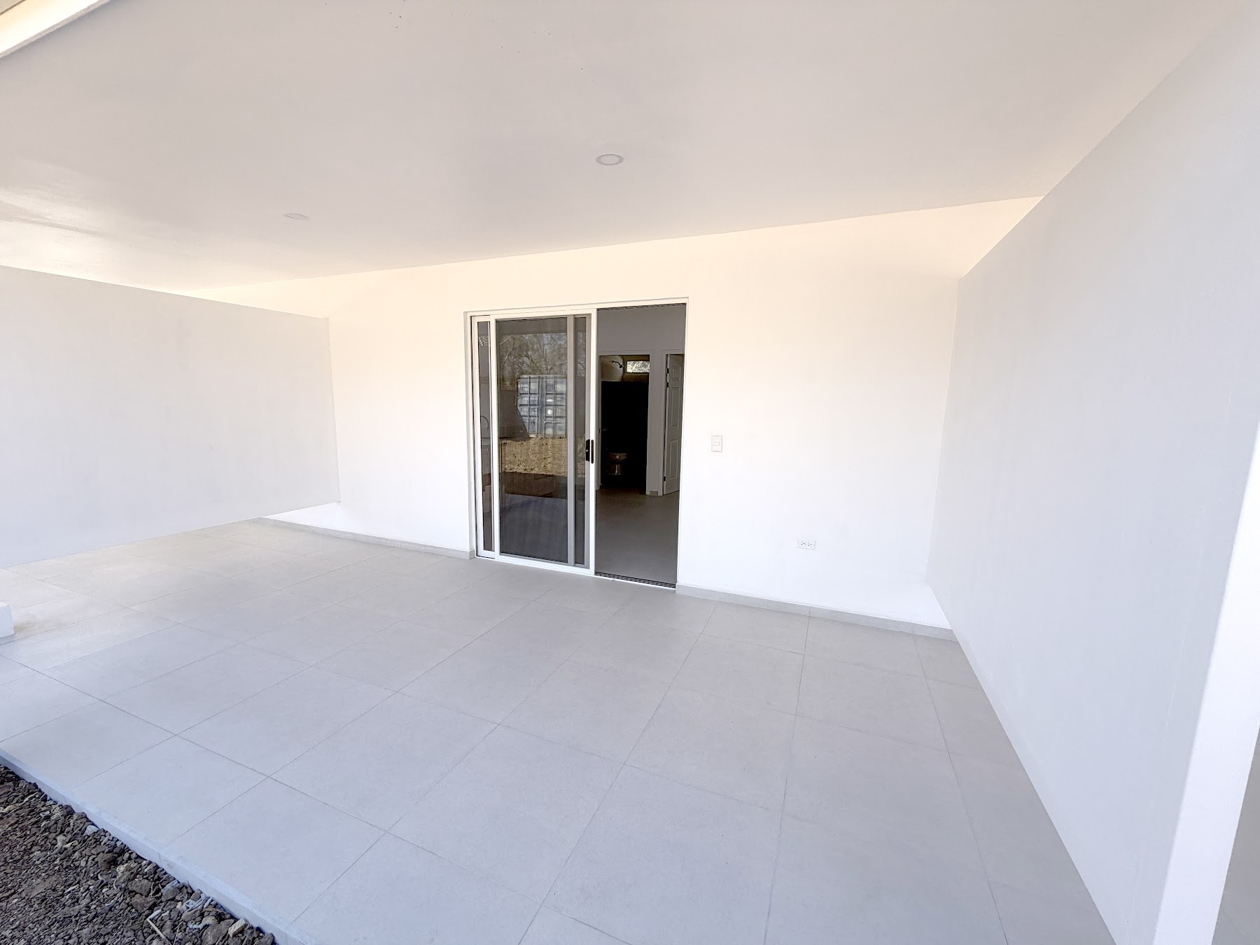 Open living space with sliding door
