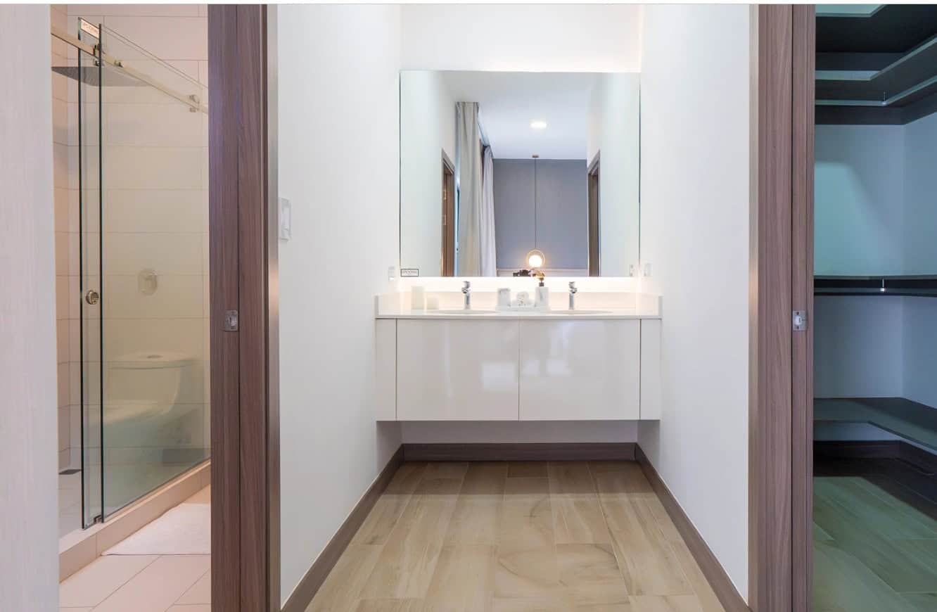 Bathroom with glass shower and floating vanity