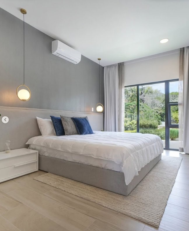 Bedroom with air conditioning and garden window