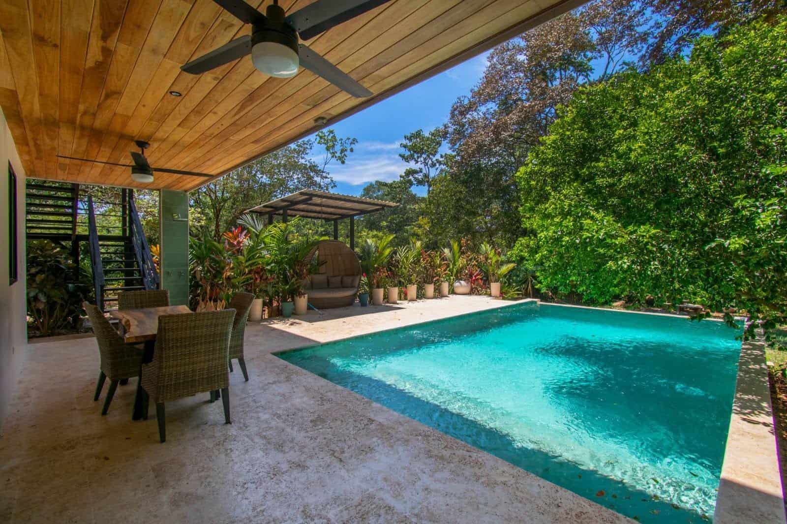 Covered terrace beside the pool, Uvita riverfront duplex for sale