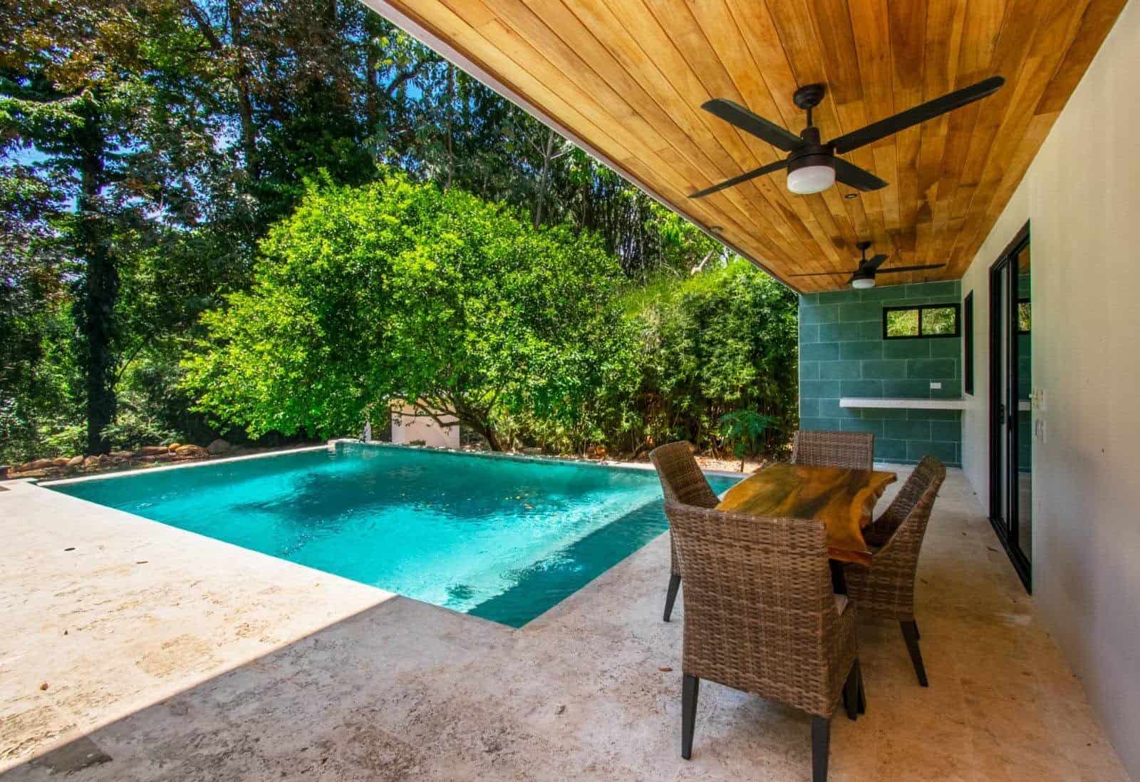 Outdoor dining by the pool, Uvita riverfront duplex for sale