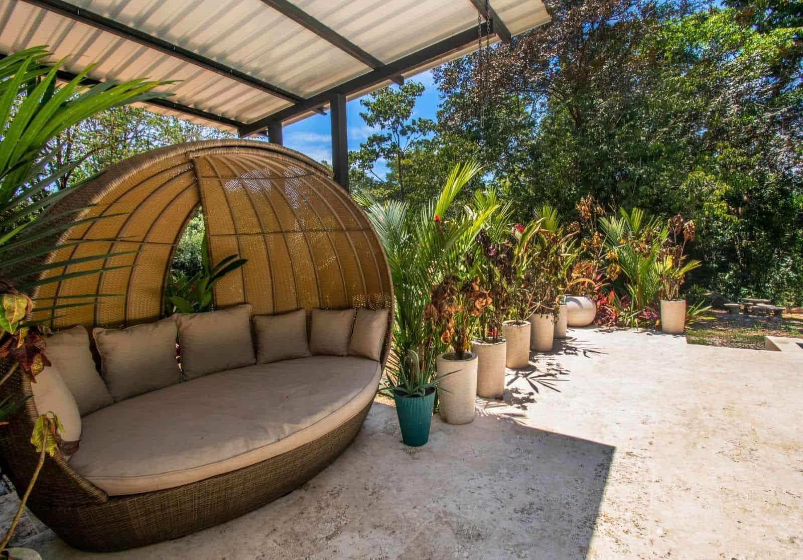 Lounge bed under the gazebo, Uvita riverfront duplex for sale