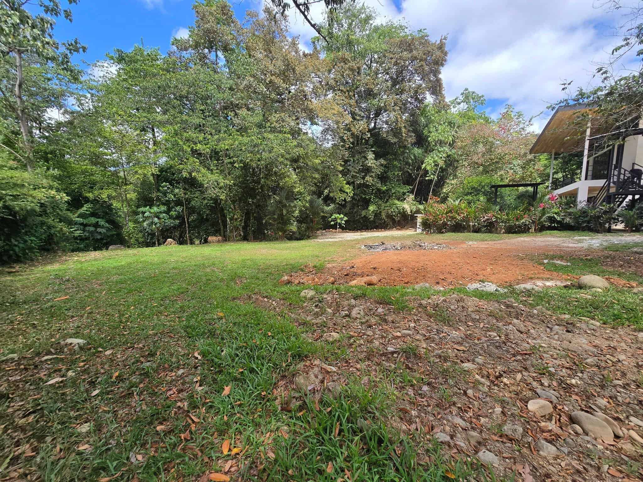 Flat land with room to build more, Uvita riverfront duplex for sale