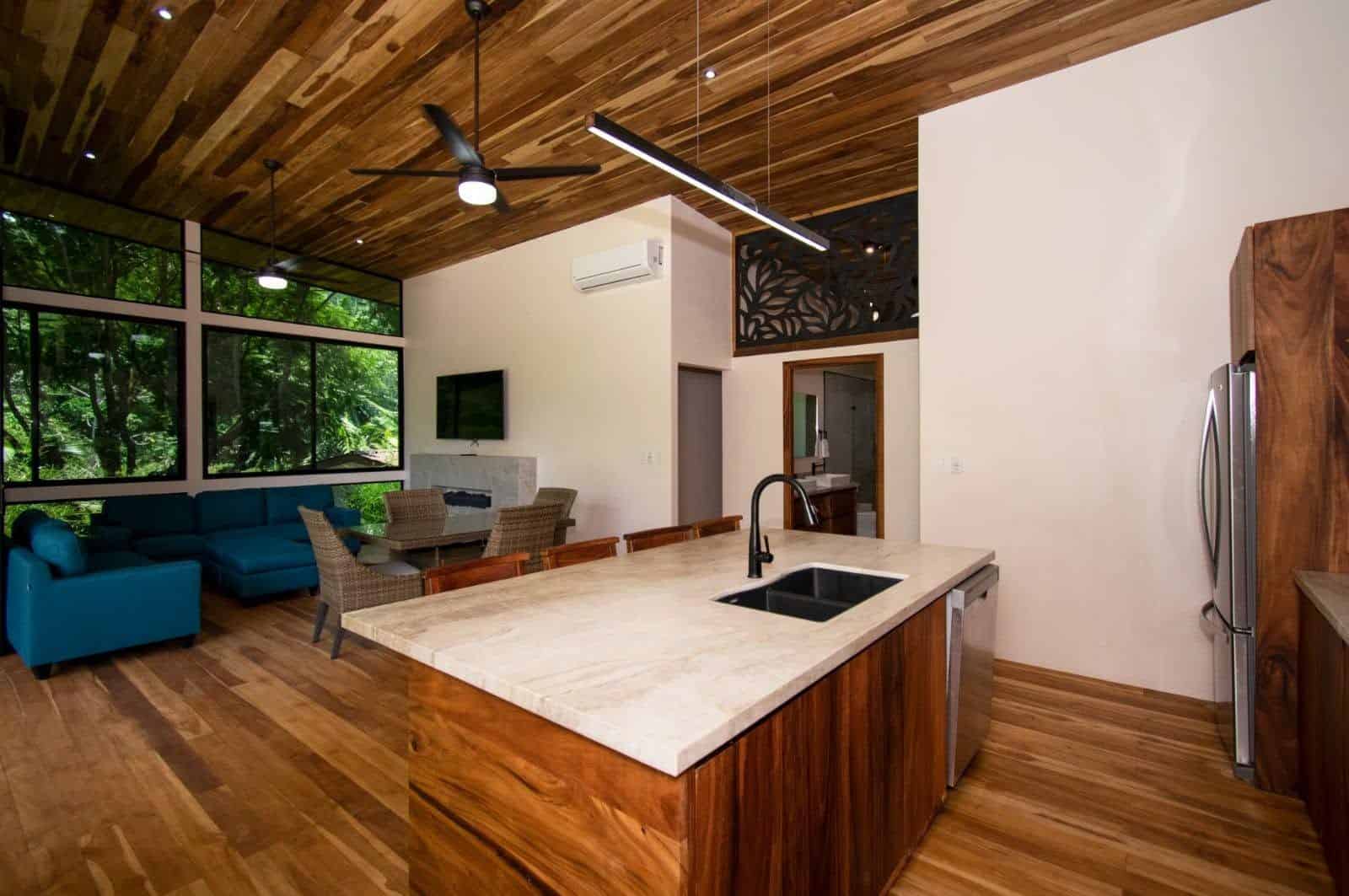 Open-plan kitchen and living area, Uvita riverfront duplex for sale