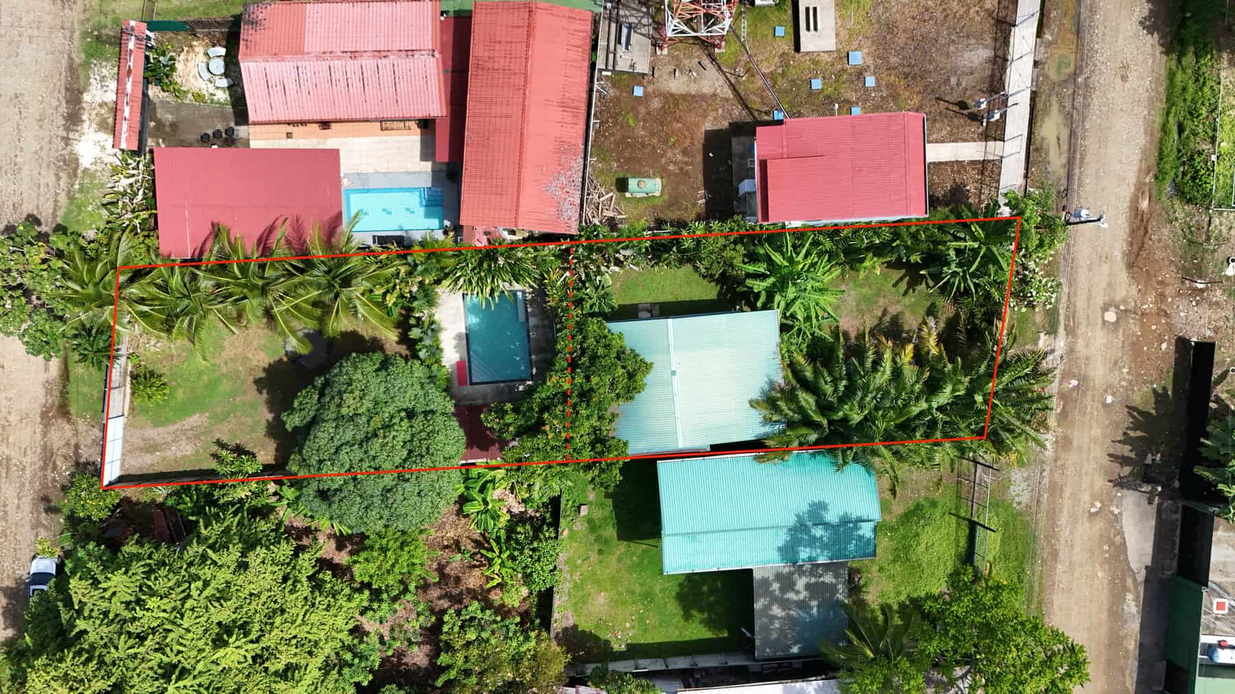 The two lots from above, with the house and pool, Uvita