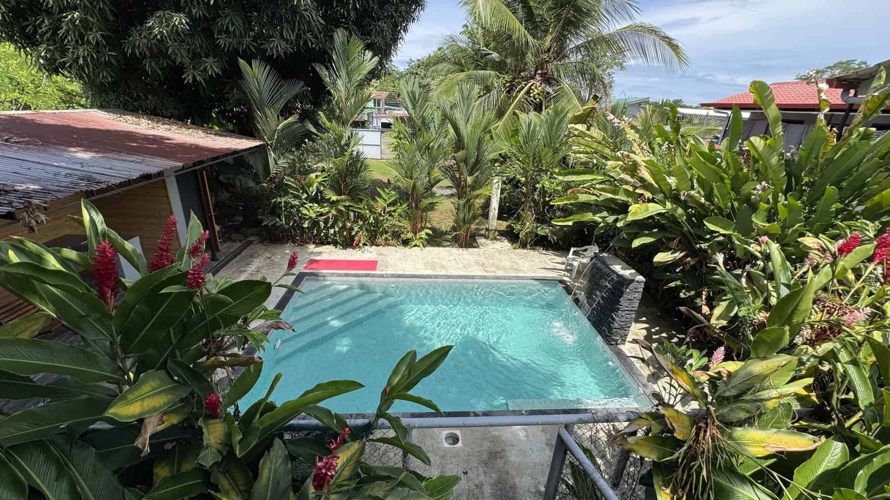 Pool with waterfall in the tropical garden, Uvita